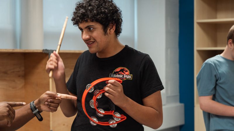 Student playing musical instruments